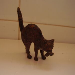Austrian cold-painted bronze of a cat with a mouse or rat in its jaws stamped BERGM