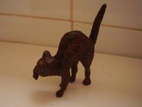 Austrian cold-painted bronze of a cat with a mouse or rat in its jaws stamped BERGM