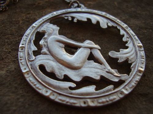 Swedish silver pendant of maiden in oak tree 1948