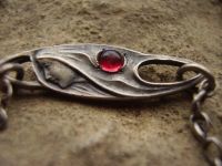 German silver and ruby Art Nouveau guard chain or necklace depicting maidens' heads